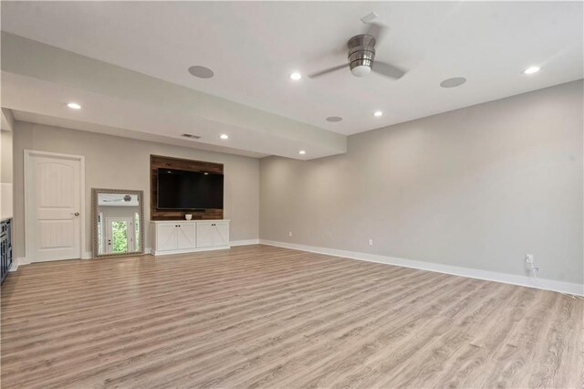 4529 Lakecrest Dr, Shawnee, KS 66218 - unfurnished living room with light wood finished floors, ceiling fan, and recessed lighting