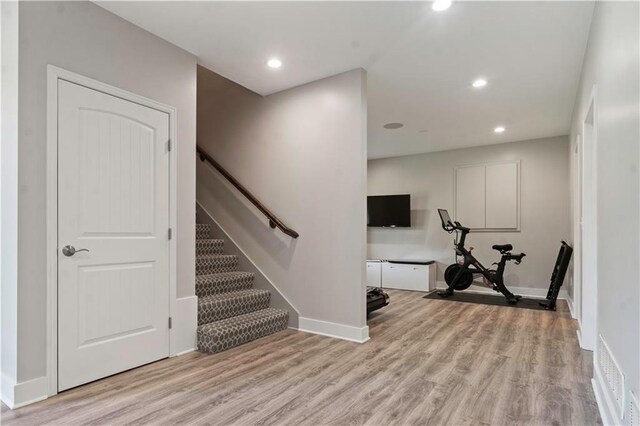 4529 Lakecrest Dr, Shawnee, KS 66218 - exercise area with wood finished floors and recessed lighting