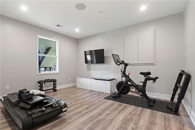 4529 Lakecrest Dr, Shawnee, KS 66218 - workout area with wood finished floors and recessed lighting