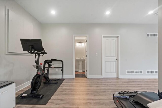 4529 Lakecrest Dr, Shawnee, KS 66218 - exercise area with light wood finished floors and recessed lighting