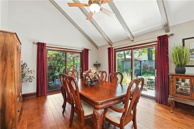 12032 Ballentine St, Overland Park, KS 66213 - dining area with beamed ceiling, light wood finished floors, high vaulted ceiling, healthy amount of natural light, and ceiling fan