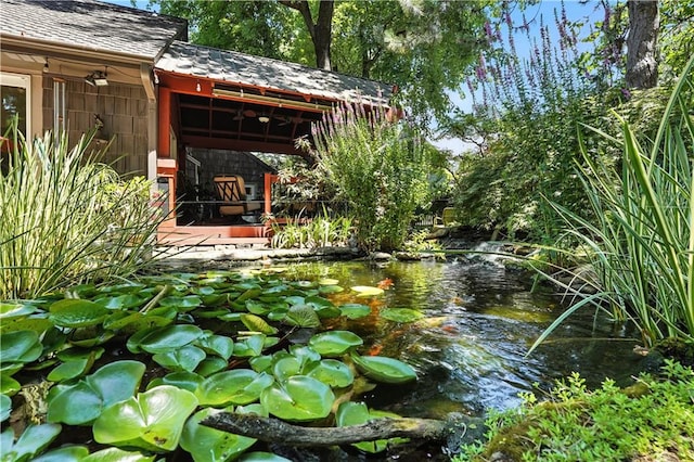 12032 Ballentine St, Overland Park, KS 66213 - view of yard with a garden pond