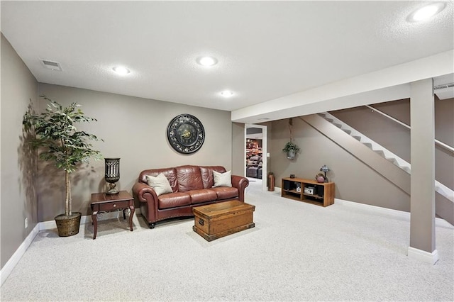 12032 Ballentine St, Overland Park, KS 66213 - carpeted living area featuring stairway, recessed lighting, and a textured ceiling