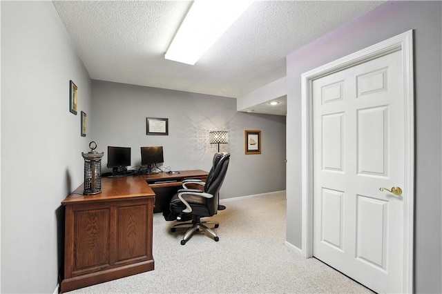 12032 Ballentine St, Overland Park, KS 66213 - carpeted home office with a textured ceiling and baseboards