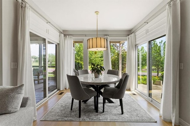 6205 W 149th St, Overland Park, KS 66223 - sunroom / solarium featuring wood finished floors