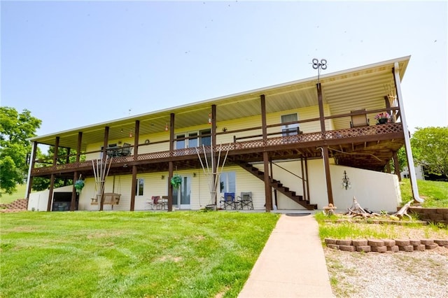 22920 Feaster Branch Rd, Warsaw, MO 64355 - rear view of property with a lawn, stairway, and a deck