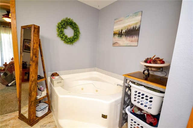 22920 Feaster Branch Rd, Warsaw, MO 64355 - bathroom featuring a tub with jets