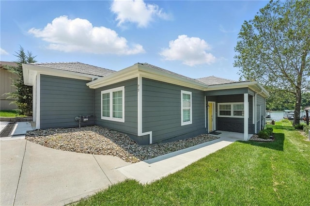9 P St, Lees Summit, MO 64086 - view of side of property featuring a lawn