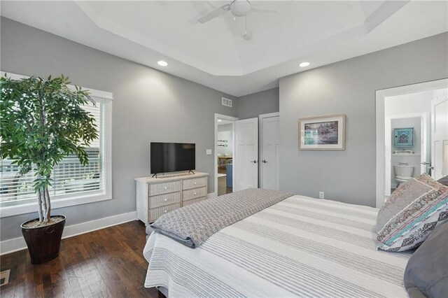 9 P St, Lees Summit, MO 64086 - bedroom featuring a tray ceiling, hardwood / wood-style flooring, recessed lighting, and a ceiling fan