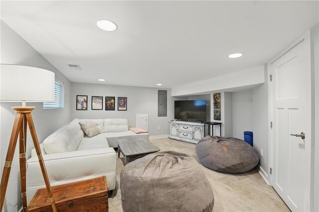 9 P St, Lees Summit, MO 64086 - living room featuring electric panel and recessed lighting