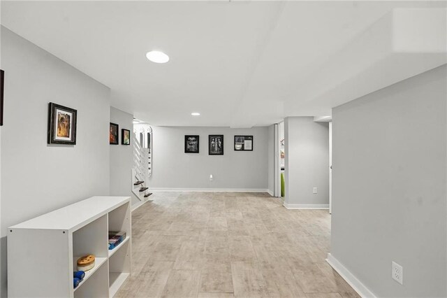 9 P St, Lees Summit, MO 64086 - finished below grade area featuring stairway and recessed lighting