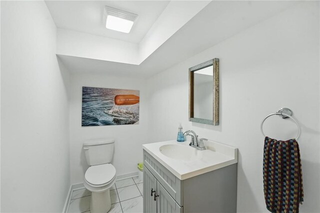 9 P St, Lees Summit, MO 64086 - half bathroom with vanity and marble finish floors