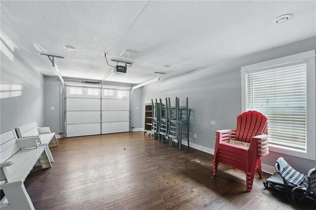 9 P St, Lees Summit, MO 64086 - garage with a garage door opener and baseboards