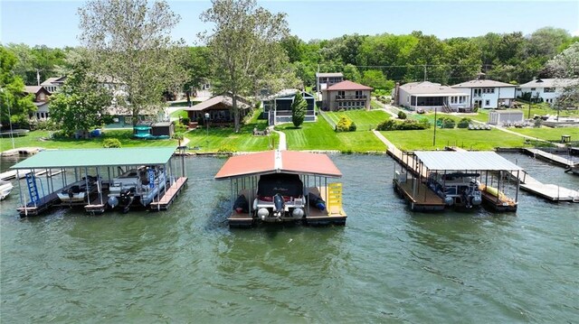 9 P St, Lees Summit, MO 64086 - dock area featuring boat lift and a water view
