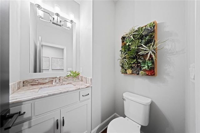 16600 Eby St, Overland Park, KS 66085 - bathroom featuring toilet and vanity