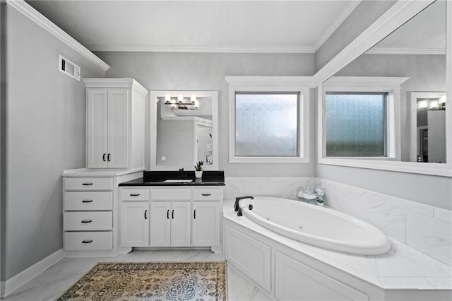 16600 Eby St, Overland Park, KS 66085 - bathroom featuring vanity, a jetted tub, marble look tile flooring, crown molding, and a chandelier