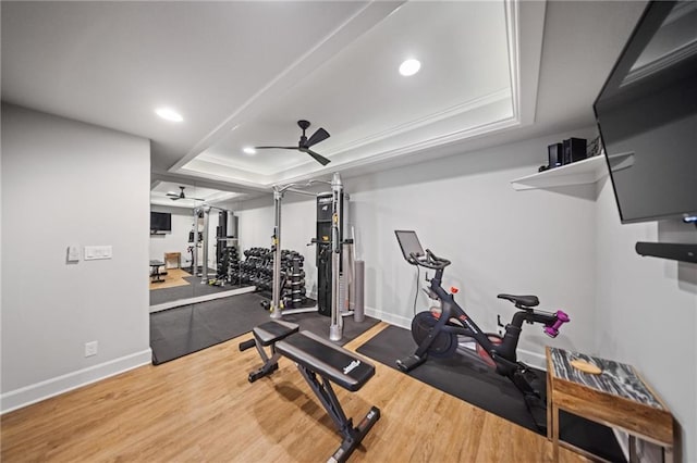 16600 Eby St, Overland Park, KS 66085 - exercise area with a raised ceiling, a ceiling fan, recessed lighting, wood finished floors, and crown molding