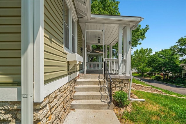 5016 Lydia Ave, Kansas City, MO 64110 - doorway to property with covered porch