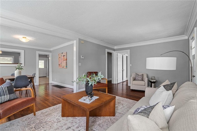 5016 Lydia Ave, Kansas City, MO 64110 - living area with a textured ceiling, wood finished floors, and crown molding