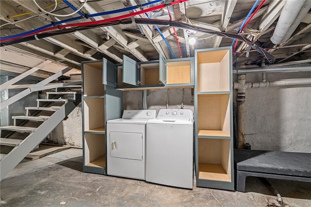 5016 Lydia Ave, Kansas City, MO 64110 - unfinished basement with washer and clothes dryer and stairs