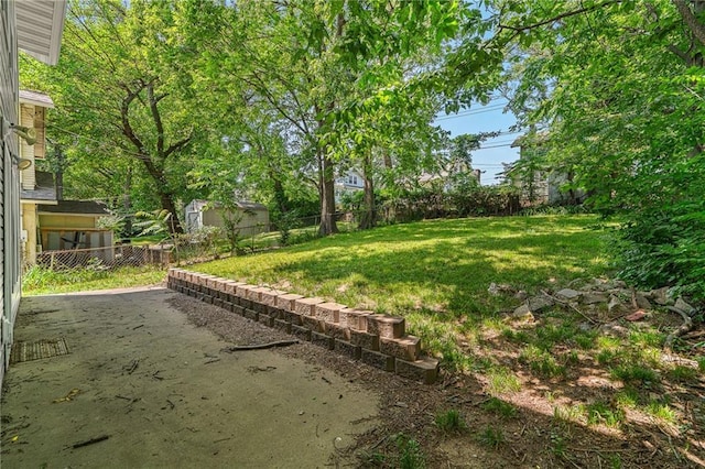 5016 Lydia Ave, Kansas City, MO 64110 - view of yard featuring a patio area