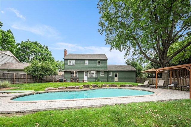 9412 Delmar St, Prairie Village, KS 66207 - view of swimming pool with a fenced backyard and a patio area