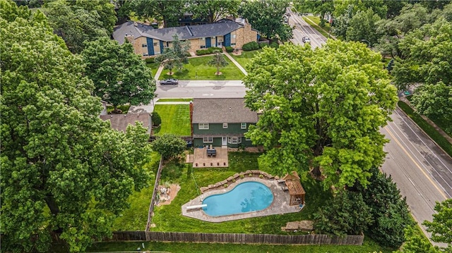9412 Delmar St, Prairie Village, KS 66207 - bird's eye view of a pool area and a tree filled landscape