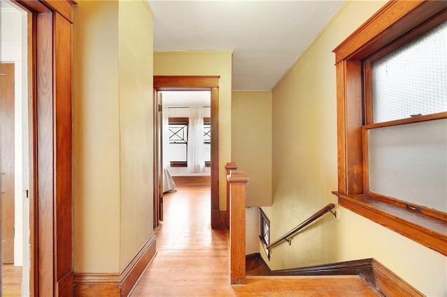 3029 E 7th St, Kansas City, MO 64124 - hall featuring an upstairs landing, healthy amount of natural light, and light wood finished floors