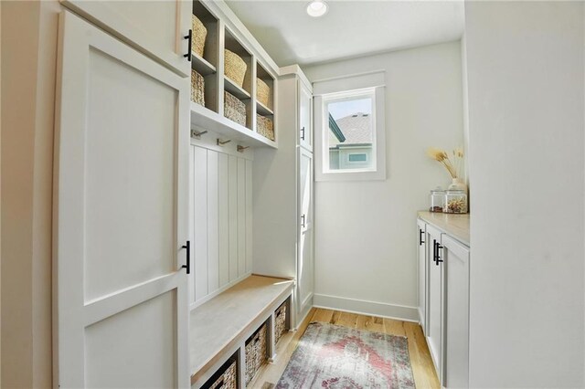 16555 S Lichtenauer Dr, Olathe, KS 66062 - mudroom featuring light wood-type flooring and recessed lighting
