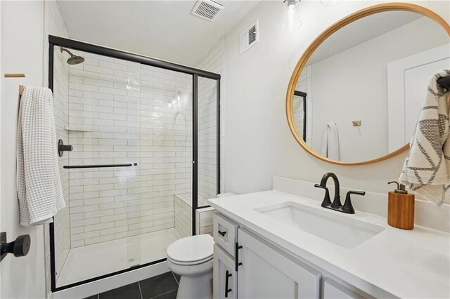 16555 S Lichtenauer Dr, Olathe, KS 66062 - bathroom with vanity, a stall shower, and tile patterned flooring