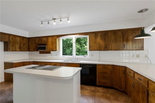 11533 Robinson St, Overland Park, KS 66210 - kitchen with dishwasher, stainless steel microwave, cooktop, and light countertops