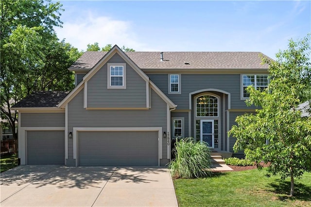 17940 W 158th Ct, Olathe, KS 66062 - traditional-style house with driveway, a shingled roof, and an attached garage