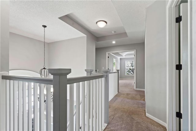 17940 W 158th Ct, Olathe, KS 66062 - hall with carpet flooring, a textured ceiling, and an upstairs landing