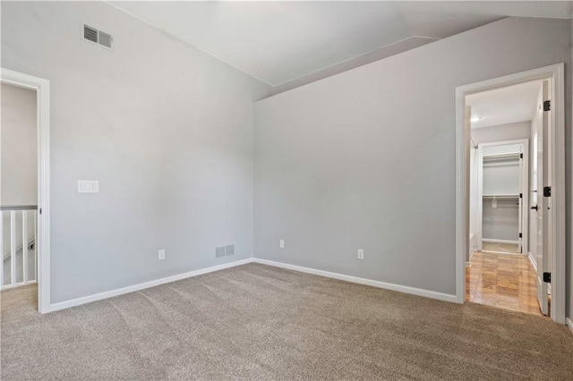 17940 W 158th Ct, Olathe, KS 66062 - carpeted spare room featuring lofted ceiling and baseboards