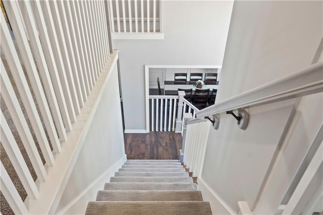 17940 W 158th Ct, Olathe, KS 66062 - stairs featuring wood finished floors and baseboards