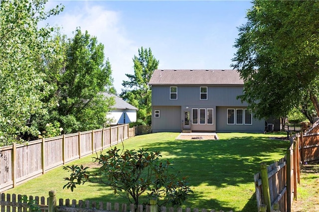 17940 W 158th Ct, Olathe, KS 66062 - back of house with a fenced backyard and a patio area