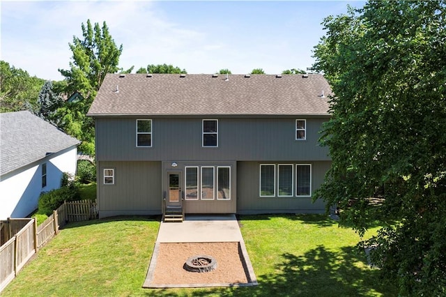 17940 W 158th Ct, Olathe, KS 66062 - rear view of property featuring an outdoor fire pit, a patio area, and a shingled roof