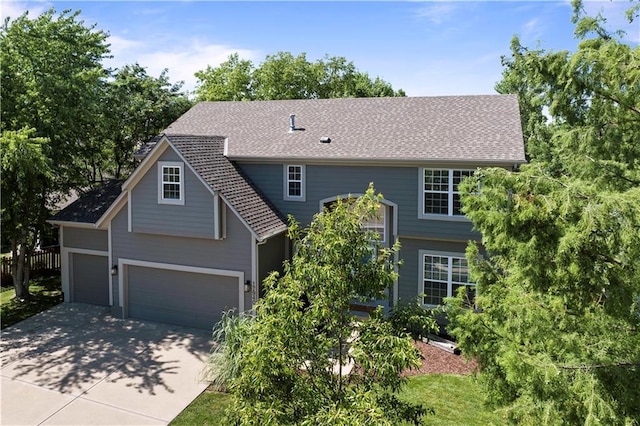 17940 W 158th Ct, Olathe, KS 66062 - traditional-style home featuring driveway and a garage