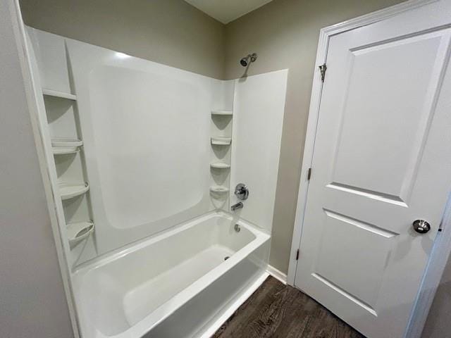 21800 Southcreek Rd, Peculiar, MO 64078 - bathroom featuring wood finished floors and shower / washtub combination