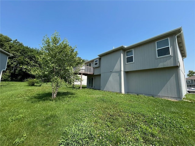 21800 Southcreek Rd, Peculiar, MO 64078 - rear view of house with a yard and a deck