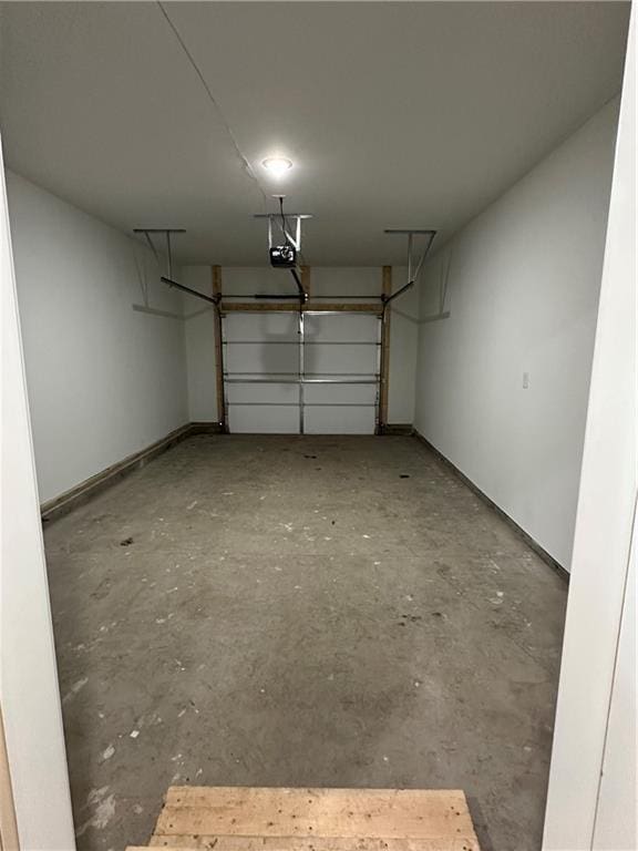 822 Carolina St, Neodesha, KS 66757 - garage featuring a garage door opener