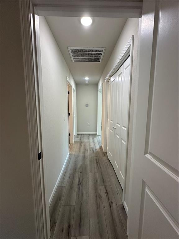 822 Carolina St, Neodesha, KS 66757 - hall with wood finished floors and baseboards