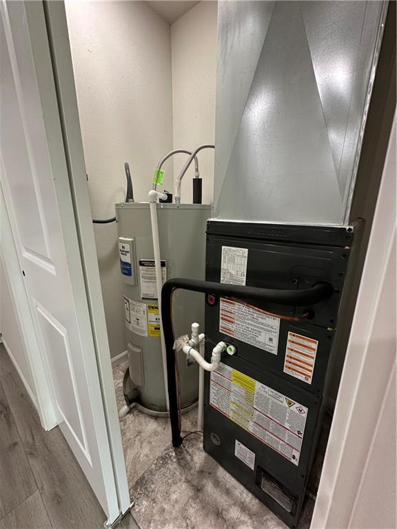 822 Carolina St, Neodesha, KS 66757 - utilities with water heater