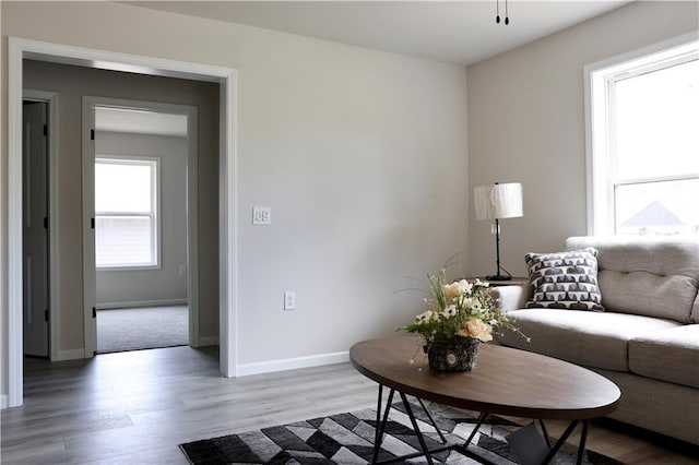 822 Carolina St, Neodesha, KS 66757 - living room featuring light wood finished floors and baseboards