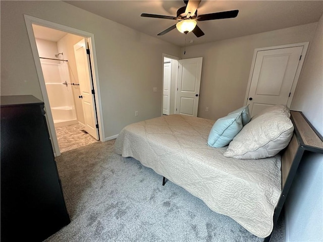 822 Carolina St, Neodesha, KS 66757 - bedroom featuring carpet flooring, a ceiling fan, and ensuite bathroom
