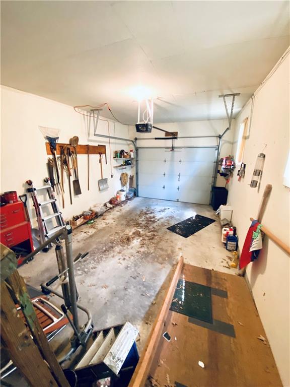 311 SW 12th Ter, Concordia, MO 64020 - garage featuring a garage door opener