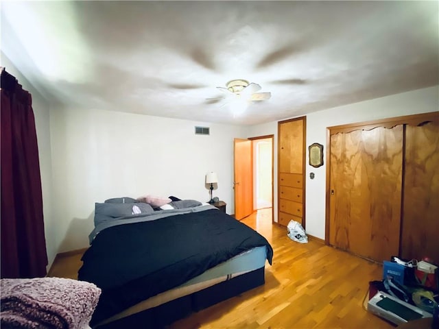 311 SW 12th Ter, Concordia, MO 64020 - bedroom featuring light wood-style floors and a ceiling fan