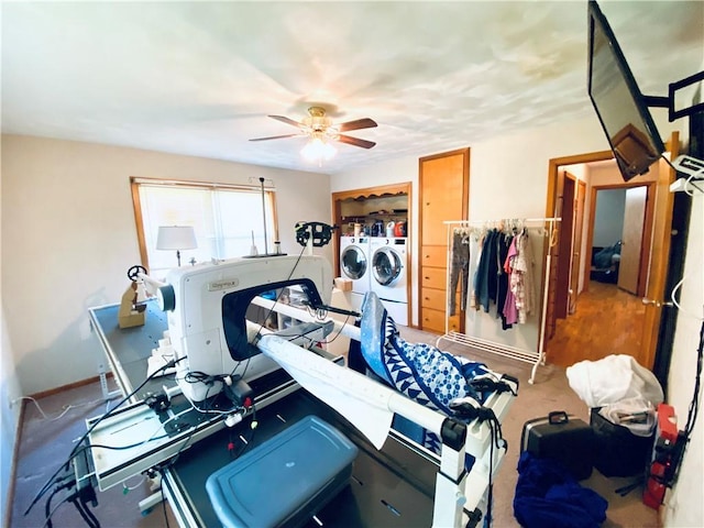 311 SW 12th Ter, Concordia, MO 64020 - workout area featuring washer and clothes dryer, ceiling fan, and baseboards