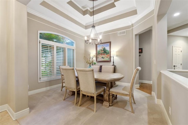 10181 S Shadow Cir, Olathe, KS 66061 - carpeted dining space featuring crown molding, a chandelier, a tray ceiling, and recessed lighting