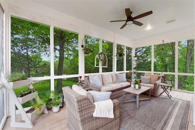 10181 S Shadow Cir, Olathe, KS 66061 - sunroom featuring an outdoor living space, ceiling fan, and plenty of natural light